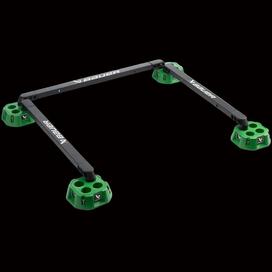 A Bauer Extendable 3 Arm Reactor Dangler, primarily black with green accents, designed for hockey training.