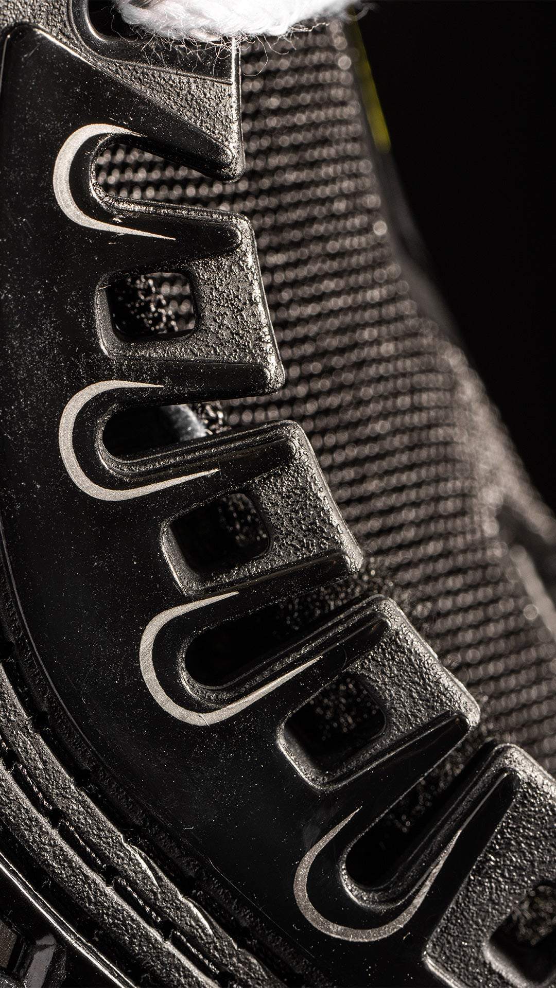 Close-up of Bauer Vapor Hyperlite2 Skates showcasing advanced blade holder design.