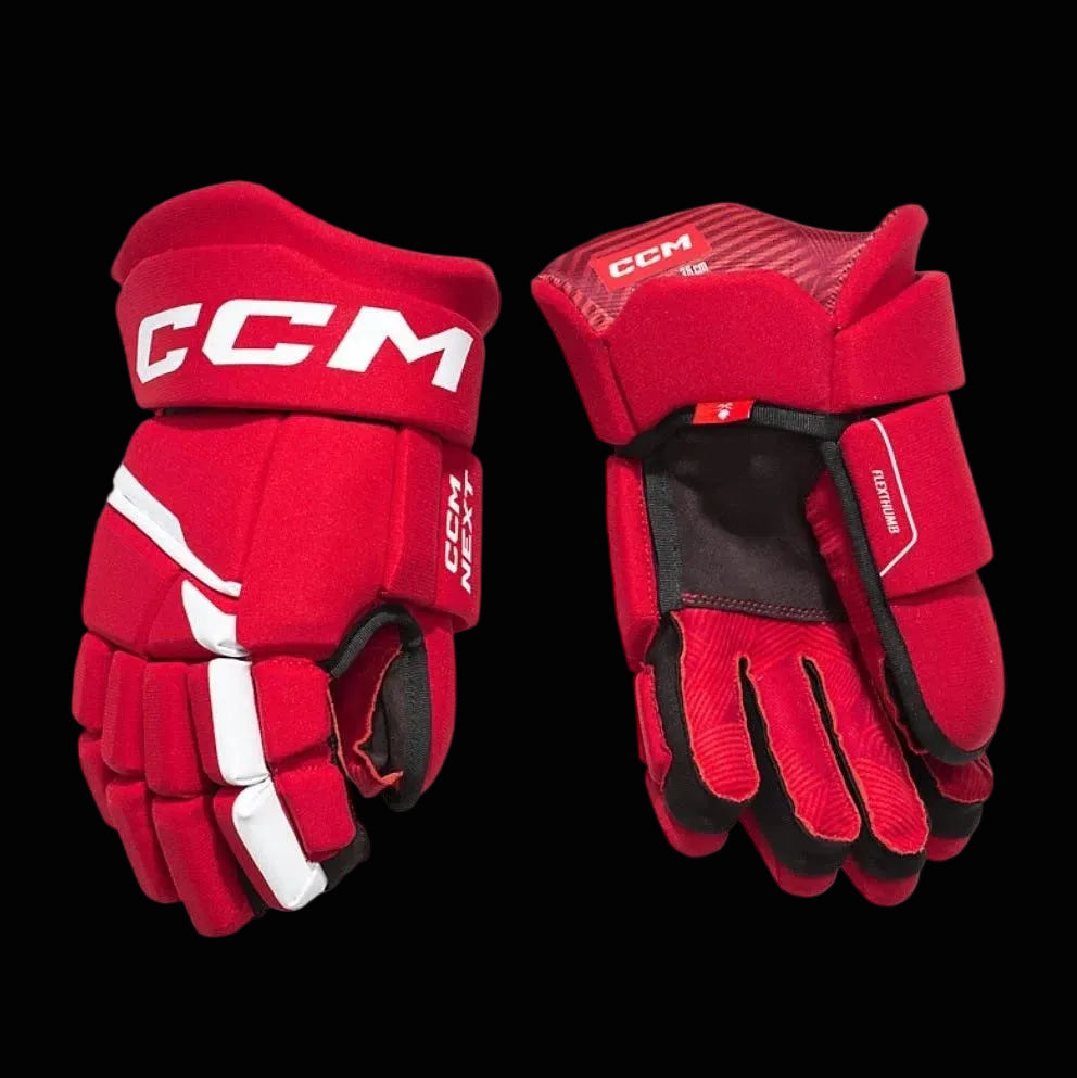 Red CCM hockey gloves