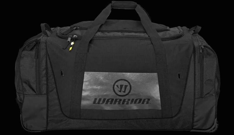 A black and grey Warrior brand cargo roller bag with multiple compartments and a sturdy handle.