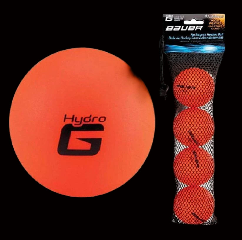 Bauer HydroG no bounce hockey balls 4 pack in a mesh bag, featuring orange and pink balls for different weather conditions.