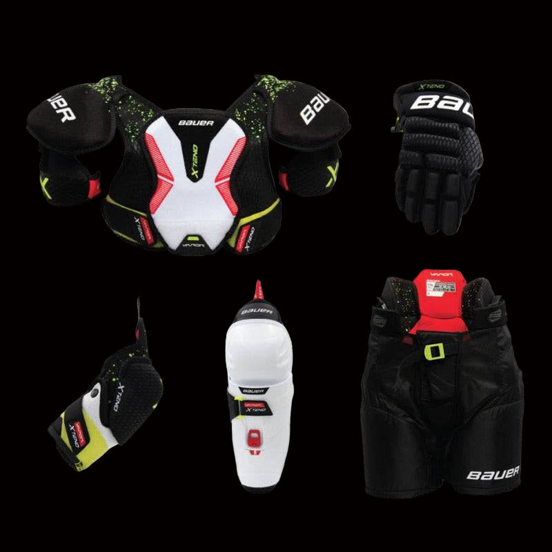 Bauer XTend Youth Starter Kit with adjustable protective gear including shoulder pads, elbow pads, gloves, pants, and shin guards.
