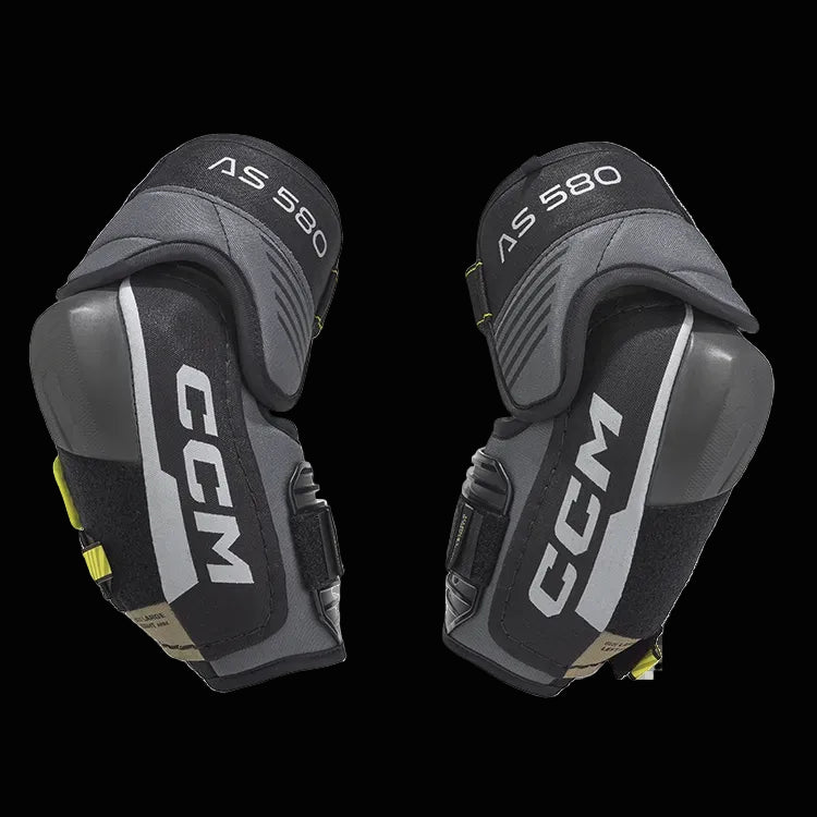 CCM Tack AS-580 Elbow Pads with anatomical shield design and adjustable forearm strap.