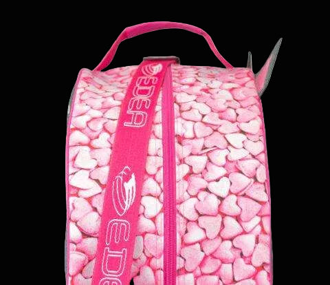 Edea Kitten Skate Bag in pink with heart design, featuring durable polyester, adjustable strap, and extra storage pockets.