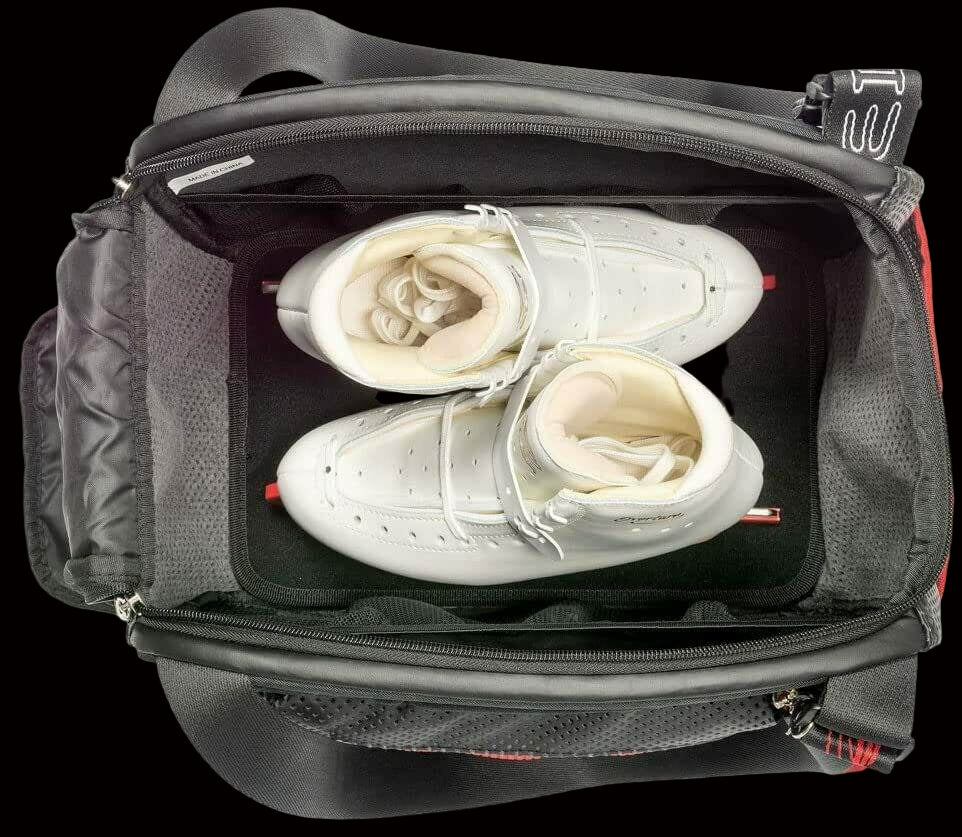 Edea Cube Skate Bag with skates inside, showing large opening and mesh pockets.