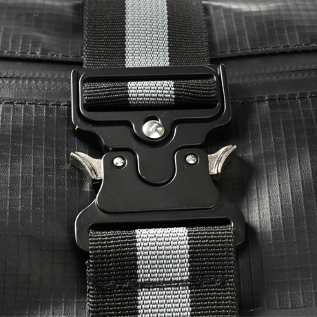 Metal buckle on Bauer Tactical Carry Bag with durable strap.