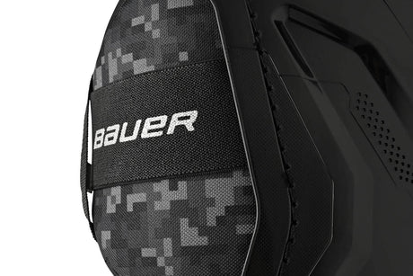 Close-up view of Bauer Supreme M3 Shin Pads showcasing X-FLEX Shield Cap design.