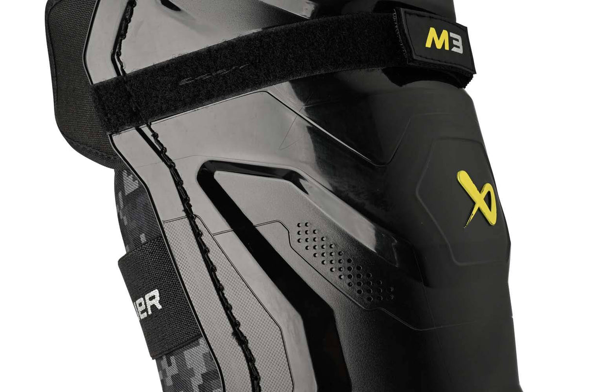 Bauer Supreme M3 Shin Pads with X-FLEX Shield Cap for mobility and protection.