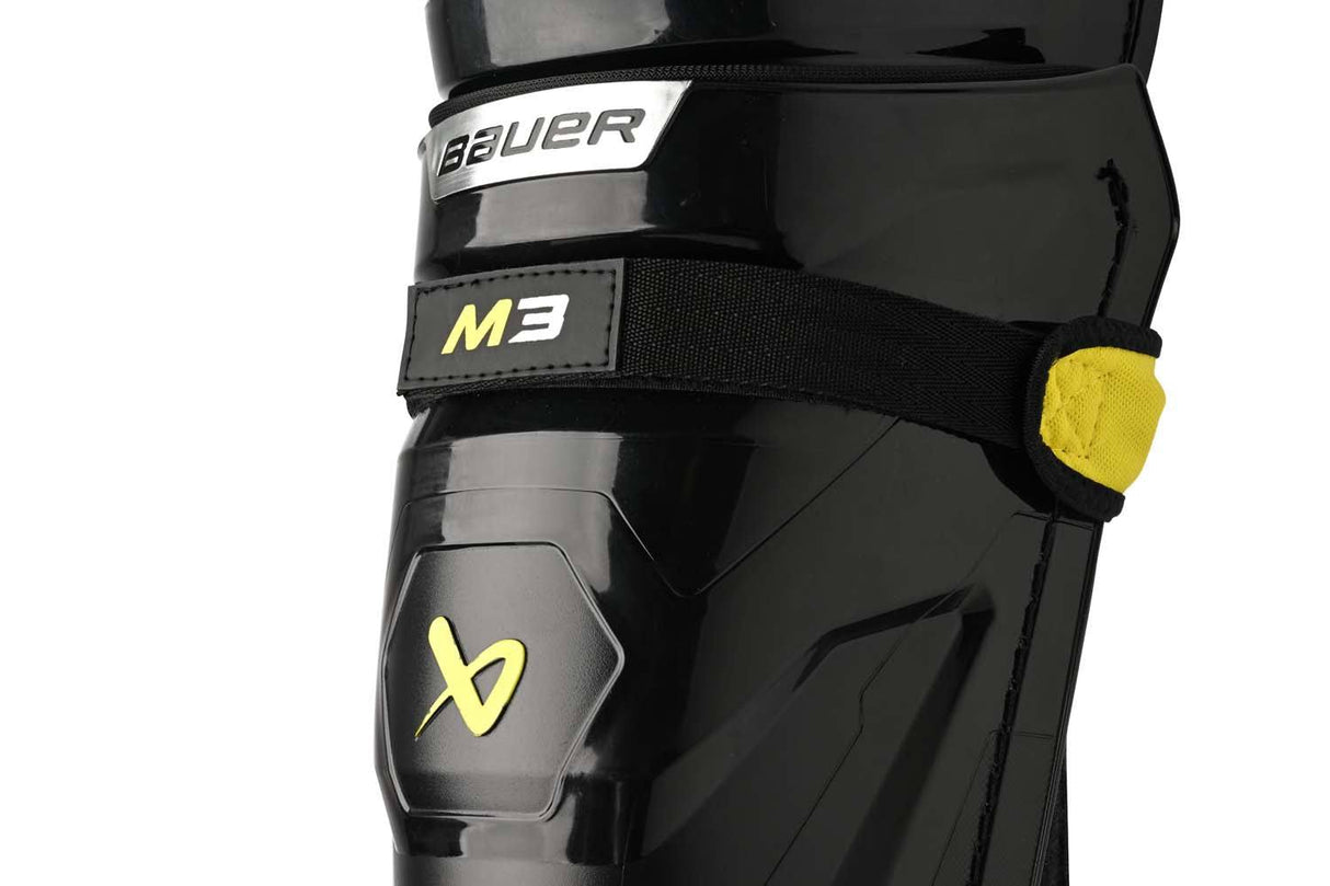 Bauer Supreme M3 Shin Pads with X-FLEX Shield Cap for enhanced mobility and protection.