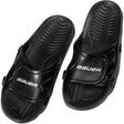 Black Bauer sandals with a white background