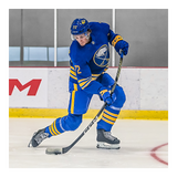 Hockey player using CCM Tacks AS6 Pro Hockey Stick on ice.