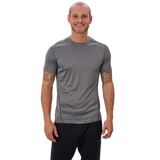 Bauer Vapor team Tech Tee in black, moisture-wicking polyester, tapered fit.