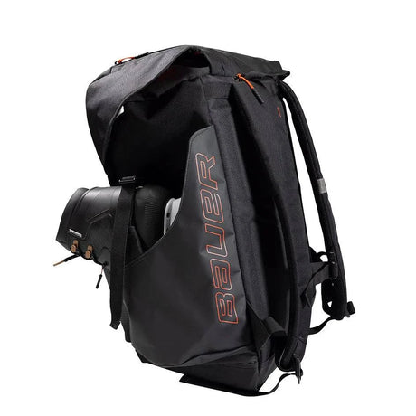 Bauer Outdoor Rink Bag with side pockets for skates and helmet clasp.