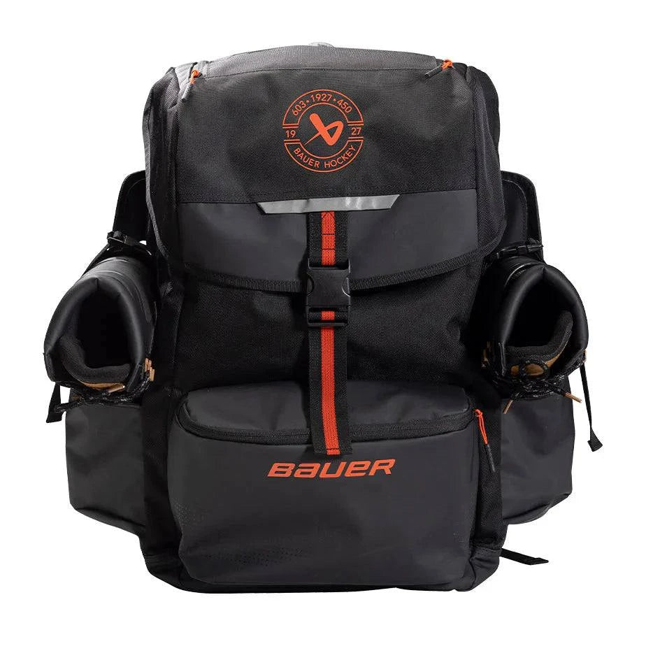 Bauer Outdoor Rink Bag with skate pockets and helmet clasp, ideal for ice skating gear.