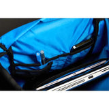 Interior view of Bauer Tactical Backpack showing blue liner, laptop and tablet sleeves, and accessory pockets.