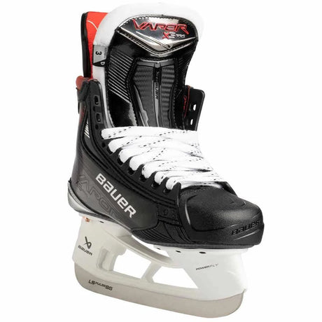 Junior Bauer Vapor X5 Pro Ice Hockey Skates with CURV Composite, POWERFLY Holder, and FLY-X runner.