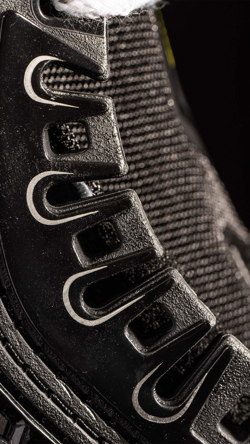 Close-up of Bauer Vapor Hyperlite2 Skates showcasing advanced blade holder design.