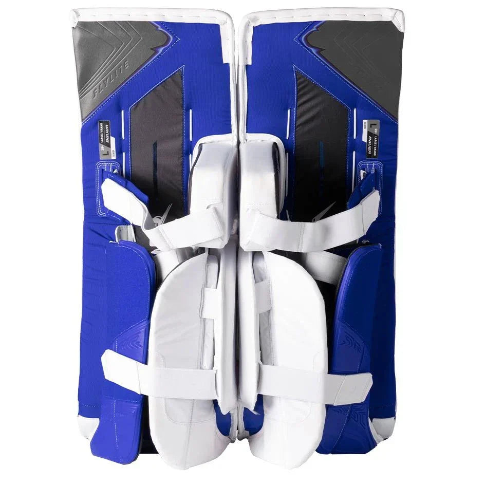 Pair of blue and white Bauer Pro hockey goalie leg pads on a white background