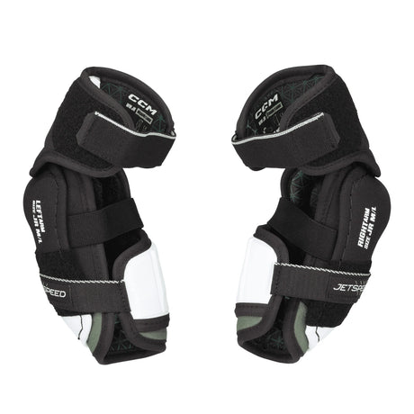 CCM FTW Hockey Elbow Pads for women, tapered fit, black and white design with straps, offering elite protection and mobility.