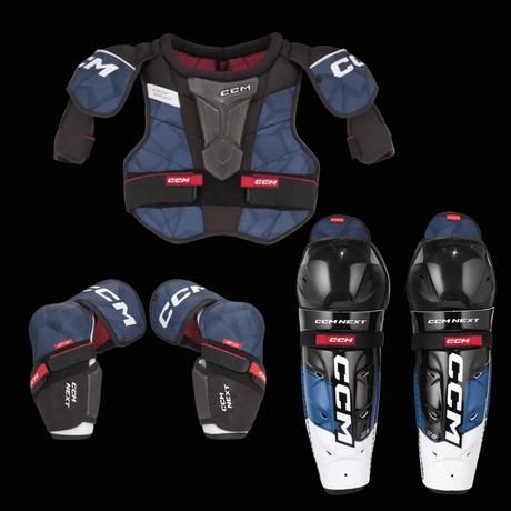 CCM hockey protective gear set including chest protector, shoulder pads, knee pads, and shin guards on a white background.
