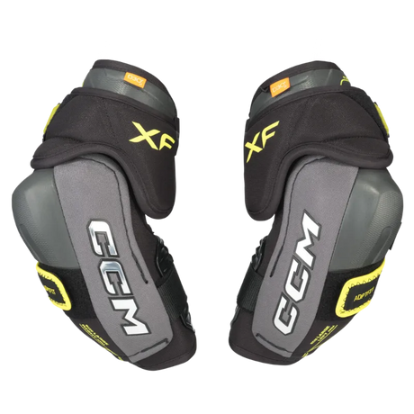 CCM Tacks XF Senior Elbow Pads with anatomical design and impact-dissipating shell.