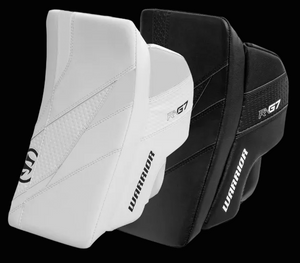 Two Warrior Ritual G7.1 RTL blockers, one in white and the other in black, designed for hockey goalkeeping.