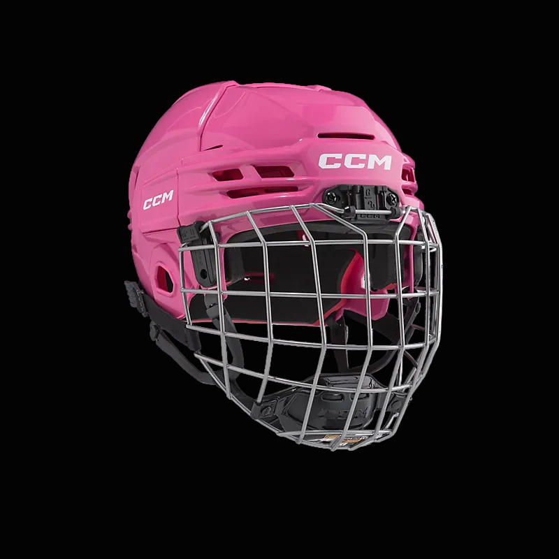 CCM Tacks 70 Helmet Combo for kids aged 7-10 with flip clip system, pink design, and vented shell.