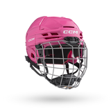 CCM Tacks 70 Helmet Combo for kids aged 7-10 with flip clip system, pink design, and vented shell.