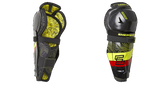 Sherwood Rekker Legend 4 Shin Pad, black and yellow design, front and side view.