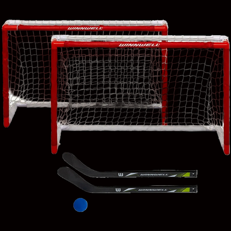 A set of Winnwell mini hockey goals with red frames and white netting, accompanied by two black mini hockey sticks and a blue EVA knee hockey ball.