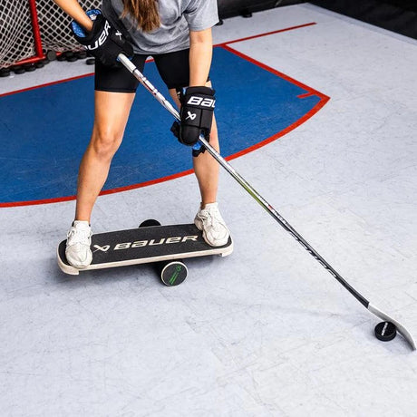 Bauer Reactor Balance Board for improving balance and core strength on ice rink.