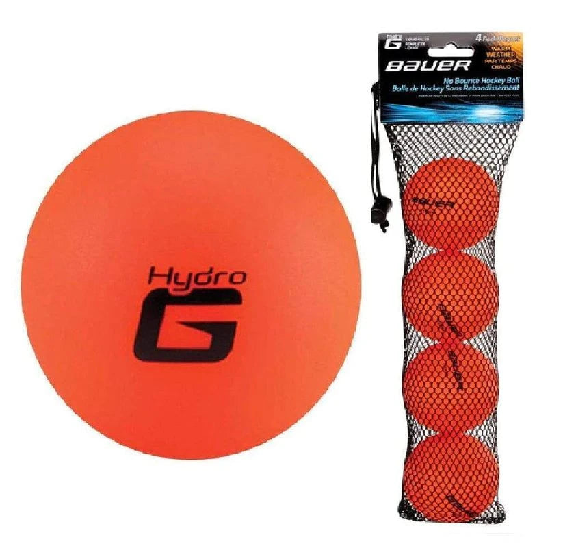 Bauer HydroG no bounce hockey balls 4 pack in a mesh bag, featuring orange and pink balls for different weather conditions.