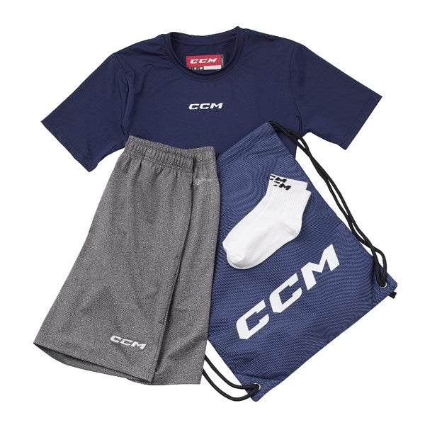 CCM Dryland Kit with navy T-shirt, grey shorts, white socks, and matching gym bag.