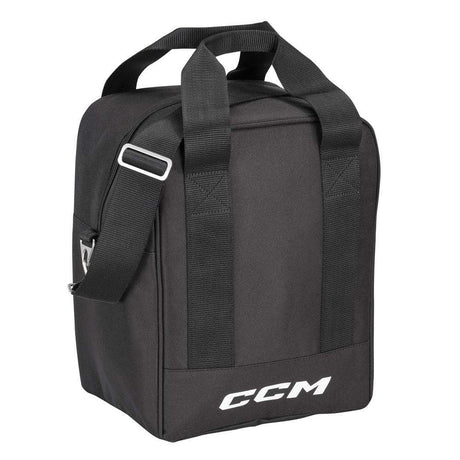 CCM BPucked Puck Bag in black with handles and strap.