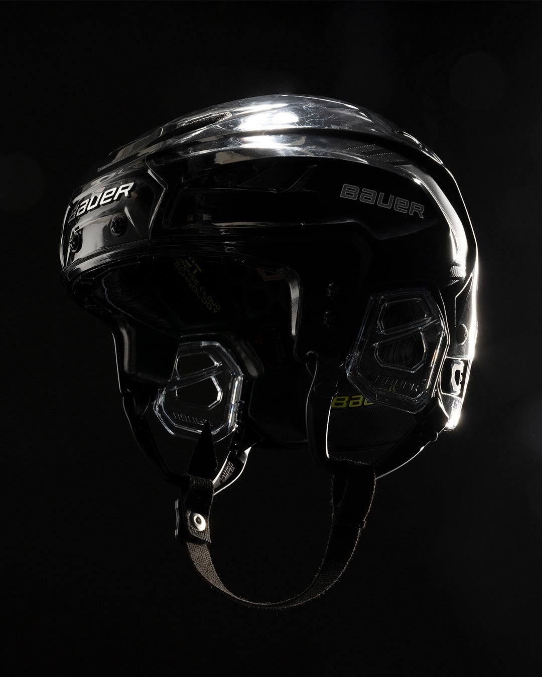 Bauer Hyperlite 2 Helmet on black background, featuring advanced design for elite-level comfort, protection, and performance.