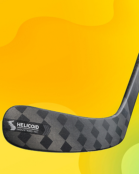 CCM Tacks AS6 Pro Hockey Stick with HELICOID blade and V shaft geometry on yellow background.