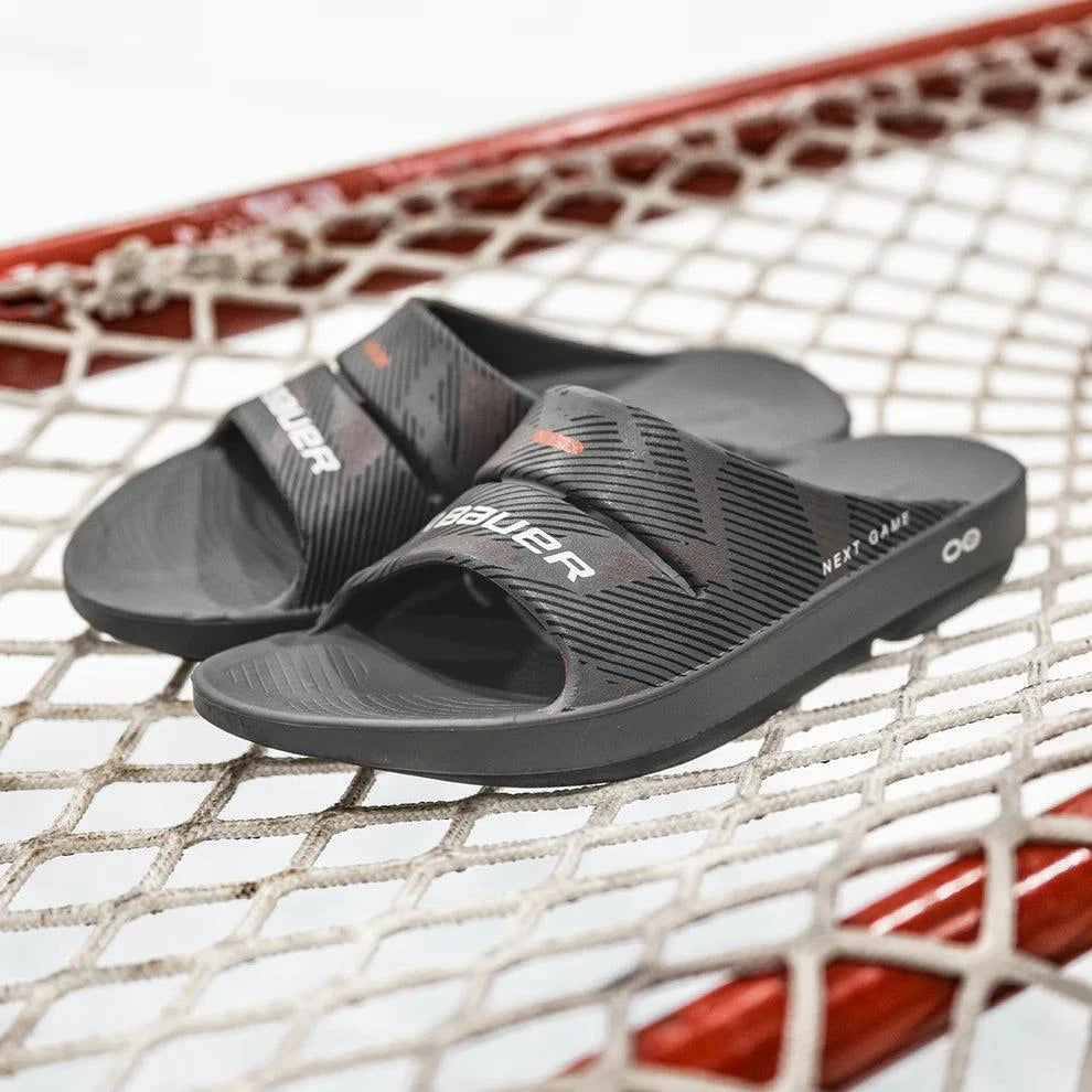 BAUER OOFOS Next Game Sport Slide on net surface with OOfoam technology.