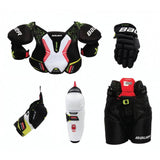 Bauer XTend Youth Starter Kit with adjustable protective gear including shoulder pads, elbow pads, gloves, pants, and shin guards.