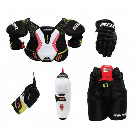 Bauer XTend Youth Starter Kit with adjustable protective gear including shoulder pads, elbow pads, gloves, pants, and shin guards.