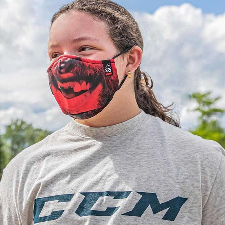 CCM Outprotect Face Mask worn outdoors, dual-layer polyester design.