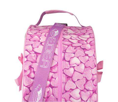 Edea Sweet Skate Bag with pink heart pattern, adjustable strap, and padded handle.