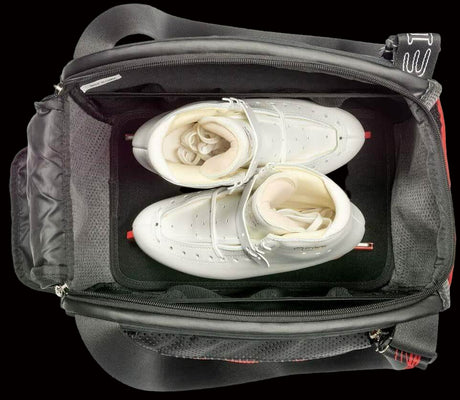 Edea Cube Skate Bag with skates inside, showing large opening and mesh pockets.