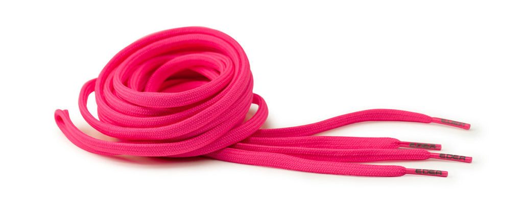 Pink Edea Fluo Laces showcasing strong polyester fibers for skating.