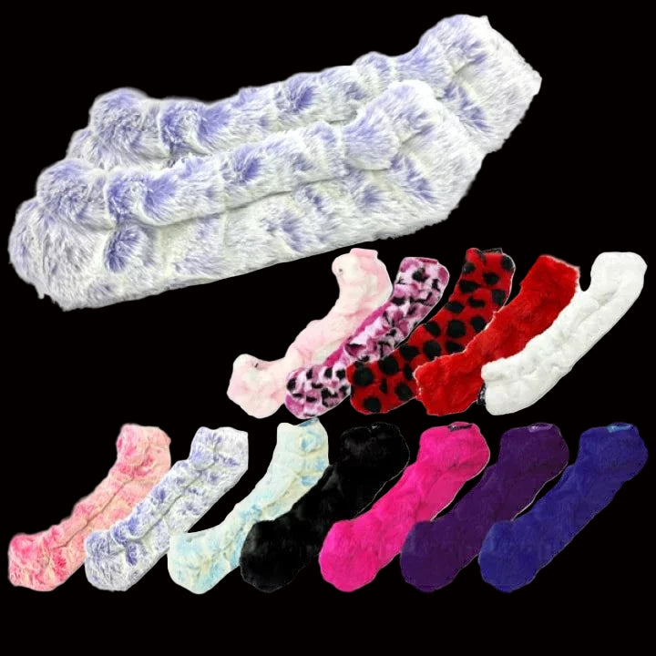Guardog Soft Paws Fuzzies Blade Soakers in various colors for figure and hockey skates, reduce moisture damage.