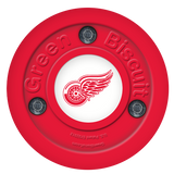 Red Green Biscuit NHL training puck with logo for off-ice practice.